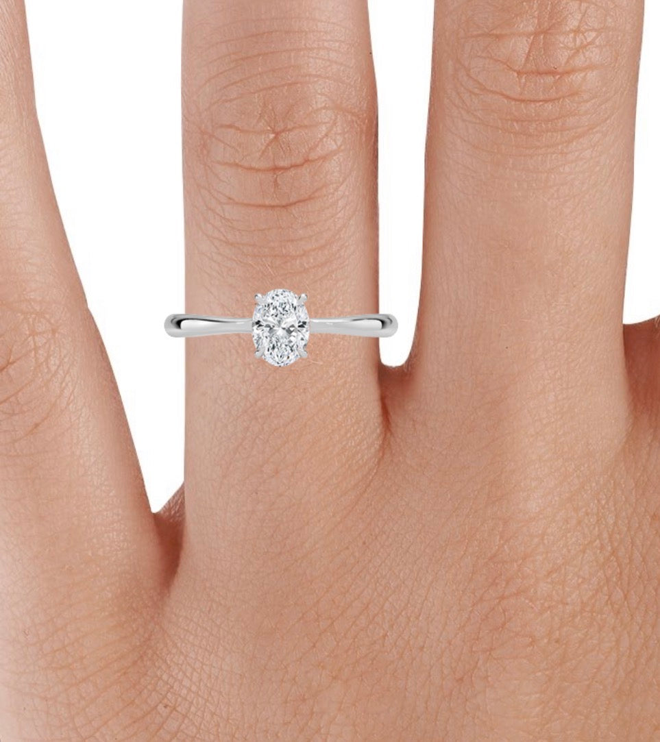 Single diamond wedding ring